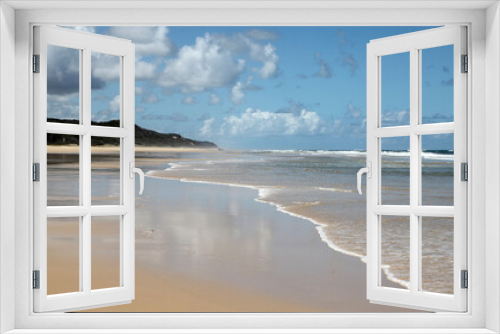 Fototapeta Naklejka Na Ścianę Okno 3D - Beautiful image of Fraser Island along 75 miles beach showing blue sky, sand, water and waves