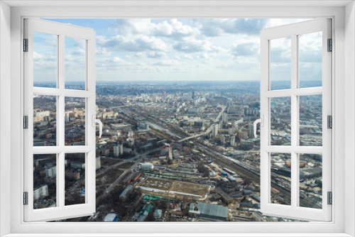 Fototapeta Naklejka Na Ścianę Okno 3D - Russia, Moscow, 2019: view from the Ostankino TV tower on a panorama of the city with railway tracks and wagons