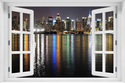 Fototapeta Naklejka Na Ścianę Okno 3D - New York City Manhattan midtown skyline at night