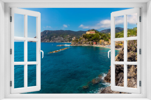 Fototapeta Naklejka Na Ścianę Okno 3D - A panorama view towards Monterosso al Mare, Italy from the path to Vernazza in summer
