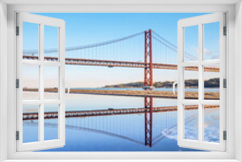 Fototapeta Naklejka Na Ścianę Okno 3D - The 24 de Abril Bridge water reflection, Lisbon, Portugal