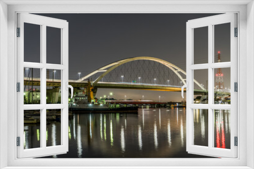 Fototapeta Naklejka Na Ścianę Okno 3D - 新浜寺大橋の明かりが水面を飾る