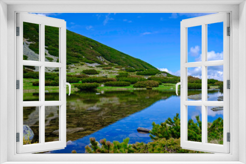 Fototapeta Naklejka Na Ścianę Okno 3D - Landscape of Clear Mountain Lake with Reflections 1