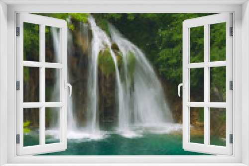 Fototapeta Naklejka Na Ścianę Okno 3D - Beautiful waterfall in lush surroundings.