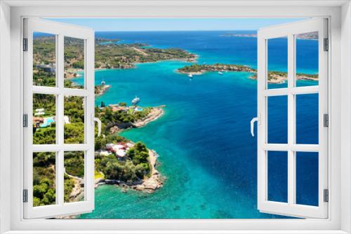 Fototapeta Naklejka Na Ścianę Okno 3D - Aerial drone photo of Chinitsa bay a popular anchorage crystal clear turquoise sea bay for yachts and sail boats next to Porto Heli, Saronic gulf, Greece