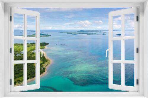 Fototapeta Naklejka Na Ścianę Okno 3D - Malay archipelago with reefs and islands. Seascape with islands in the early morning, aerial drone. Beautiful landscape on the island of Luzon. Caramoan Islands, Philippines.
