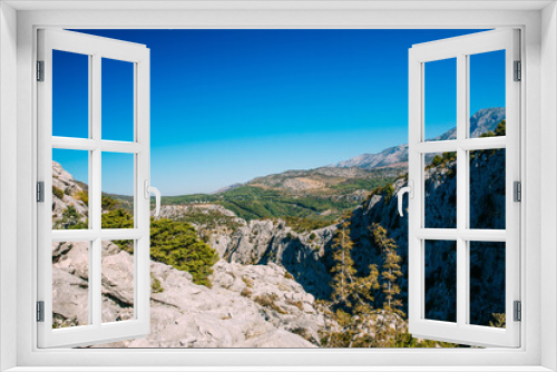 Fototapeta Naklejka Na Ścianę Okno 3D - Beautiful city of Omis, Croatia seen from the Stari Grad fortress. 