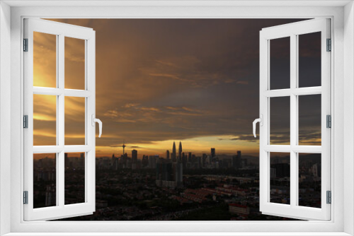 Fototapeta Naklejka Na Ścianę Okno 3D - Sunset over the city