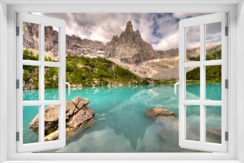 Fototapeta Naklejka Na Ścianę Okno 3D - Turquoise Sorapis Lake near Cortina d'Ampezzo, with Dolomite Mountains and Forest - Sorapis Circuit, Dolomites, Italy, Europe, summer picture.