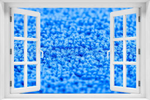 Fototapeta Naklejka Na Ścianę Okno 3D - Background made of blue microfiber fabric, selective focus.
