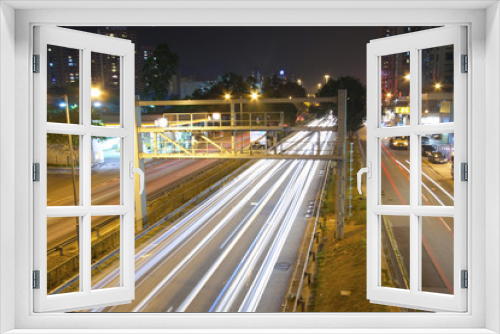 Fototapeta Naklejka Na Ścianę Okno 3D - Traffic in city at night