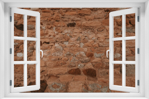 Fototapeta Naklejka Na Ścianę Okno 3D - Stone wall texture/background,historical old ancient stone,preserved to our time, stones are laid evenly, solid construction has been standing for many centuries,ancient buildings,buildings and ruins