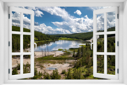 Fototapeta Naklejka Na Ścianę Okno 3D - Pristine view of Nymph Lake in Yellowstone National Park, featuring lodgepole pines and thermal hot springs