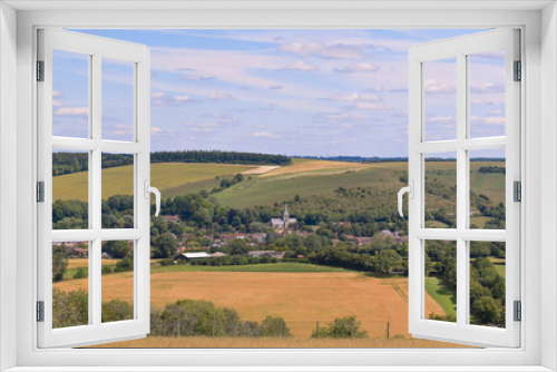 Fototapeta Naklejka Na Ścianę Okno 3D - Countryside Summers View on a Hill Looking at a Village 