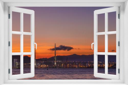 Fototapeta Naklejka Na Ścianę Okno 3D - Panorama landscape of harbor and bridge of Hong Kong city under sunset