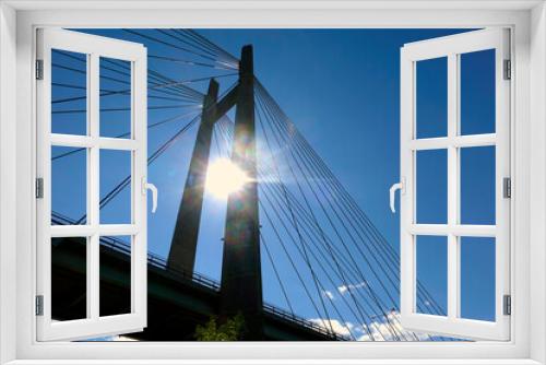 Fototapeta Naklejka Na Ścianę Okno 3D - Cable-stayed bridge detail in backlit.