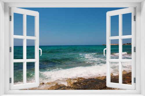 Fototapeta Naklejka Na Ścianę Okno 3D - Background of blue sea. Rocky coast of the sea. Mediterranean sea in Cyprus. Nature background. Blue lagoon. Sea shore with summer Sunny day.