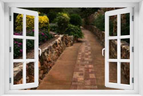 Fototapeta Naklejka Na Ścianę Okno 3D - Beautiful path in a garden