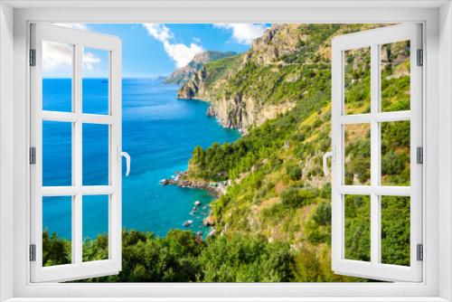 Fototapeta Naklejka Na Ścianę Okno 3D - A view from the famous Amalfi Coast drive road towards the cliffs, mountains, coastline, beaches and Mediterranean Sea near the town of Sorrento, Italy