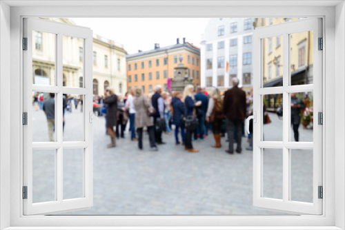 Fototapeta Naklejka Na Ścianę Okno 3D - Blurred crowd gathering in the center of the Old Town in Stockholm, Sweden