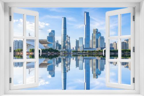 Fototapeta Naklejka Na Ścianę Okno 3D - Mirrored scenery of CBD buildings in Zhujiang New Town, Guangzhou, China