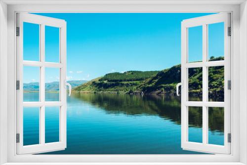Fototapeta Naklejka Na Ścianę Okno 3D - blue reservoir under blue sky