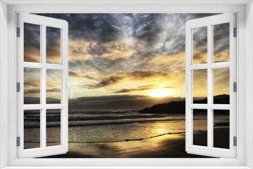 Fototapeta Naklejka Na Ścianę Okno 3D - Cloudy sky sunset on the beach in Bandon Oregon Pacific Ocean Coast.