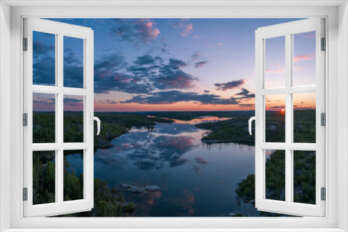 Fototapeta Naklejka Na Ścianę Okno 3D - Sunset at a flat calm lake in Northwest Ontario, Canada.