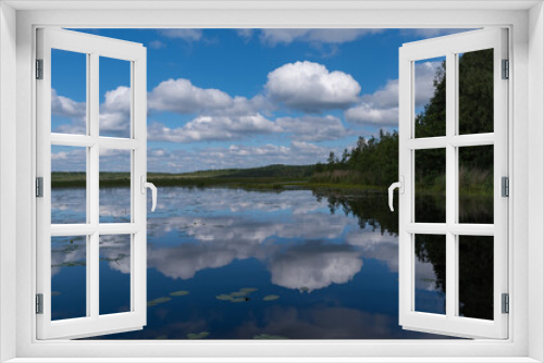 Fototapeta Naklejka Na Ścianę Okno 3D - Cloud reflection in Okhotnichye (Hunters) Lake. Eco route in the 