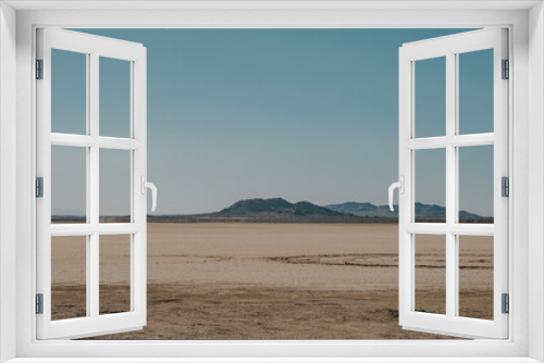 Fototapeta Naklejka Na Ścianę Okno 3D - El Mirage Dry Lakebed desert Landscape in mid day