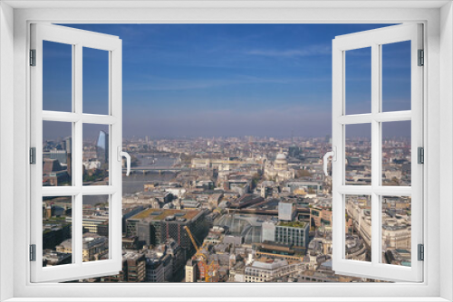 Fototapeta Naklejka Na Ścianę Okno 3D - An aerial view of London, UK along the River Thames.