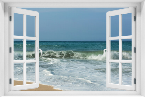 Fototapeta Naklejka Na Ścianę Okno 3D - The big breaking waves during a strom at the beautiful summer sea shore background the blue sky and horizon