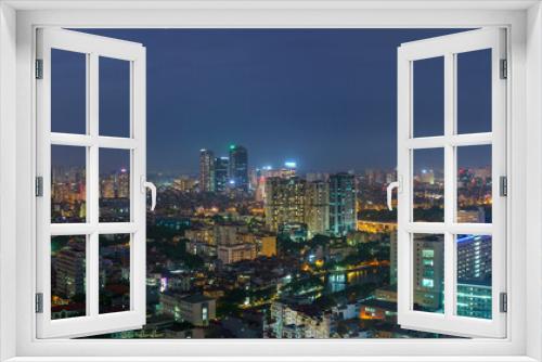 Fototapeta Naklejka Na Ścianę Okno 3D - Cityscape of Hanoi skyline at Nguyen Chi Thanh street, Dong Da district during sunset time in Hanoi city, Vietnam in 2020