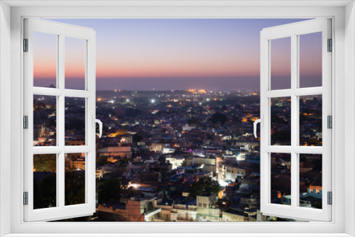 Fototapeta Naklejka Na Ścianę Okno 3D - Overhead view of rooftops at dawn in Jodhpur , India