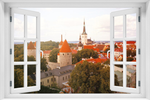 Fototapeta Naklejka Na Ścianę Okno 3D - Panoramic view of the central streets of Tallinn on a summer morning in Estonia. Real grain scanned film.