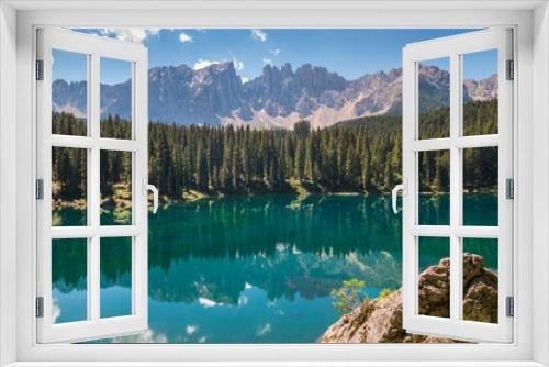 Fototapeta Naklejka Na Ścianę Okno 3D - Scenic view of Carezza Lake - Lago di Carezza - Karersee, South Tyrol, Italy.
