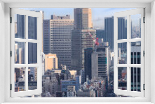 Fototapeta Naklejka Na Ścianę Okno 3D - Landscape of tokyo city skyline in Aerial view with skyscraper, modern office building and blue sky background in Tokyo metropolis, Japan.