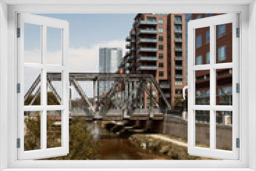 Fototapeta Naklejka Na Ścianę Okno 3D - Various steel pedestrian bridges along pathway of Cherry Creek Trail in Downtown, Denver.  Denver, Colorado, USA