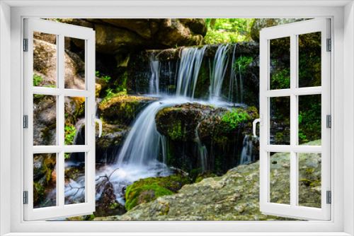 Fototapeta Naklejka Na Ścianę Okno 3D - Beautiful waterfall on small river in a park