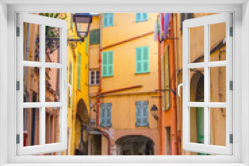 Fototapeta Naklejka Na Ścianę Okno 3D - Colorful buildings in the mediaeval town of Menton, French Riviera city in the Mediterranean, France.