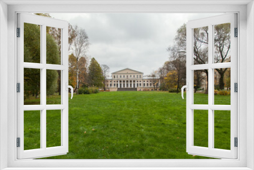 Fototapeta Naklejka Na Ścianę Okno 3D - A small lawn in front of an old aristocratic estate