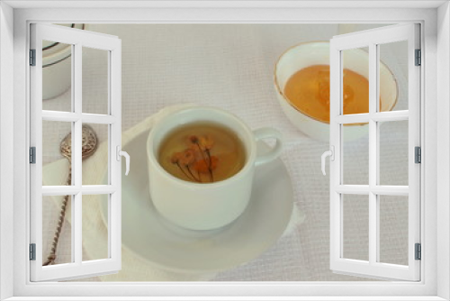 Fototapeta Naklejka Na Ścianę Okno 3D - a cup of tea with herbs and honey