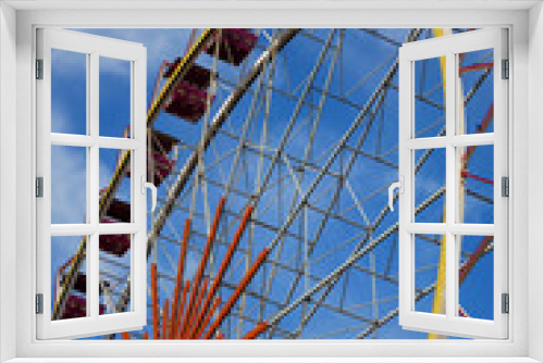 Fototapeta Naklejka Na Ścianę Okno 3D - Ferris wheel. Open booths of the Ferris wheel at the sky with beautiful clouds. Rides at city Park.