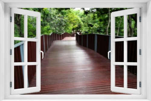 Fototapeta Naklejka Na Ścianę Okno 3D - Blur Wooden bridge pathway in Thai park