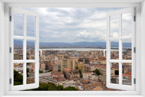 Fototapeta Naklejka Na Ścianę Okno 3D - View of Cagliari on a cloudy summer day