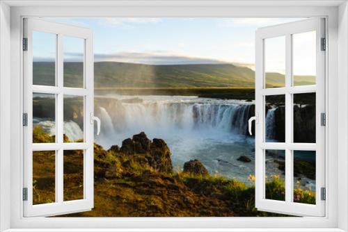Fototapeta Naklejka Na Ścianę Okno 3D - Misty Icelandic Waterfall at Sunset