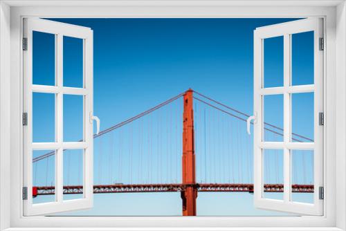Fototapeta Naklejka Na Ścianę Okno 3D - Golden Gate Bridge detail with blue sky
