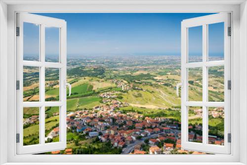 Fototapeta Naklejka Na Ścianę Okno 3D - Panorama of Republic of San Marino and Italy from Monte Titano, City of San Marino. City of San Marino is capital city of Republic of San Marino located on Italian peninsula, near Adriatic Sea.