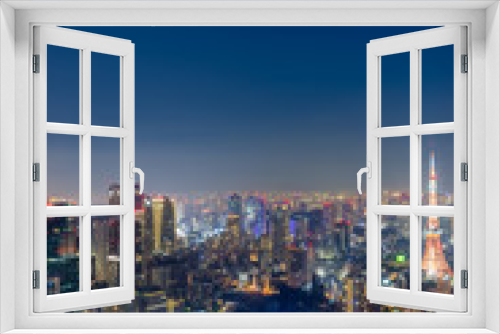 Fototapeta Naklejka Na Ścianę Okno 3D - 東京都港区六本木の高層ビルの展望台から見た夜の東京の都市景観