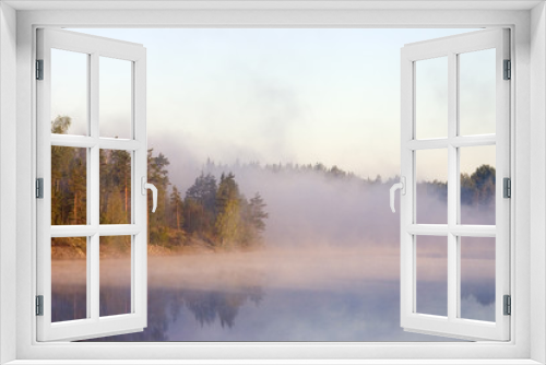 Fototapeta Naklejka Na Ścianę Okno 3D - Fog at a dawn on lake in Kareliya